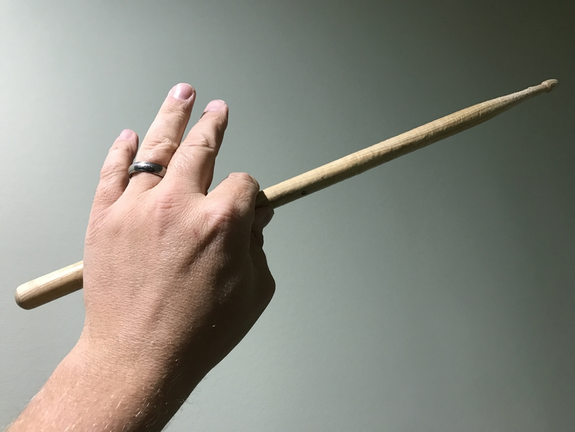showing where to establish a fulcrum for gripping the drumstick