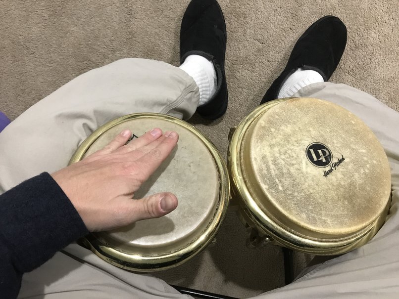 how to play bongos using ring and middle finger used for toe stroke on macho drum technique