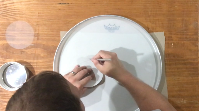 cutting a hole in the front bass drum head